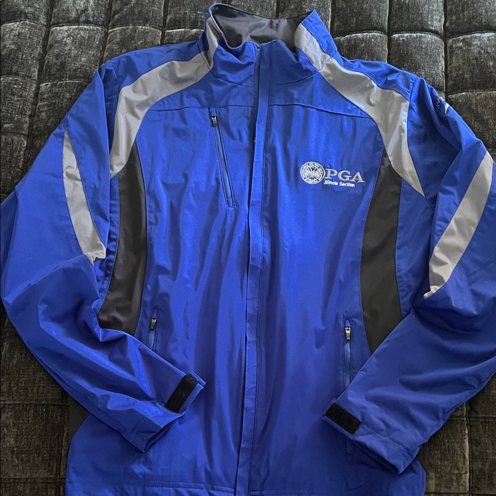 Antigua Blue and Gray Performance Jacket with PGA logo